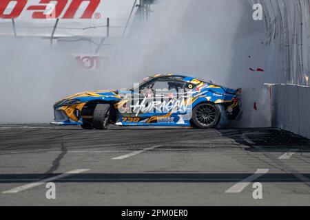 Olekskii Holovnia from Huragan Racing smashes into the way in the first corner of the course eliminating him from the qualifying round. For the 20th consecutive season Formula Drift kicks off the start to the 2023 Pro Championship competition in downtown Long Beach, California. Hosting a two day event with the qualifying rounds beginning on Friday April 7th, and concluding with championship competition on April the 8th. Drivers from across the globe battled it out in a Smokey and high horsepower fight to the top with only the toughest able to make it through each round. With the short beach co Stock Photo