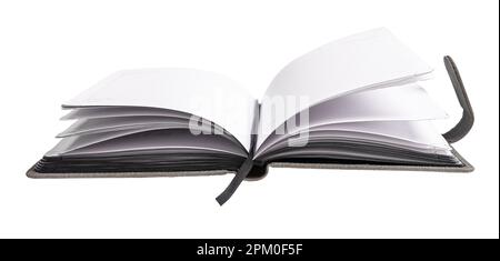 Open notepad, note book, office paper planner with ribbon bookmark isolated on white. Stock Photo