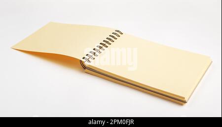 Open empty spiral bound sketchbook, drawing paper notepadperspective view. Stock Photo