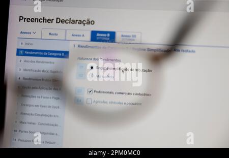 Azores, Portugal - 07.04.2023: Portuguese IRS - filling the IRS Statement Mod. 3 Simplified Taxation System "Regime Simplificado Tributação" Stock Photo