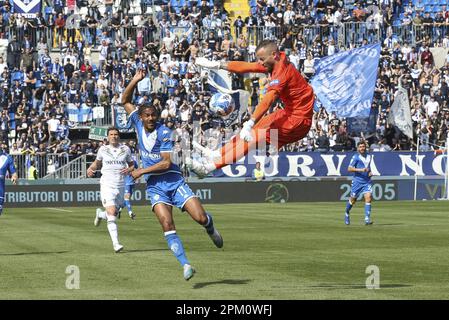 Brescia, Italy. 10th Apr, 2023. Antony Iannarilli of Ternana Calcio makes a save on Florian Aye of Brescia FC during Brescia FC vs Ternana Calcio, 32° Serie BKT 2022-23 game at Mario Rigamonti stadium in Brescia, Italy, on April 10, 2023. Credit: Live Media Publishing Group/Alamy Live News Stock Photo