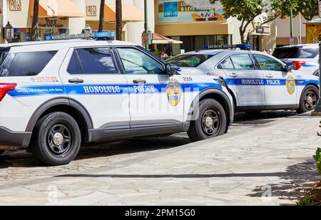Waikiki, Oahu, Hawaii, USA, - February 6, 2023: Honolulu Police Cars parked on Kalakaua Avenue in Waikiki Stock Photo