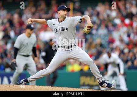 CLEVELAND, OH - APRIL 12: New York Yankees shortstop Anthony Volpe (11)  makes the catch for an out during the eighth inning of the the Major League  Baseball game between the New