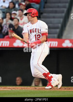 ANAHEIM, CA - APRIL 23: Los Angeles Angels right fielder Hunter Renfroe  (12) congratulates center fielder Mike Trout (27) after Trout hit a solo  home run in the sixth inning during a