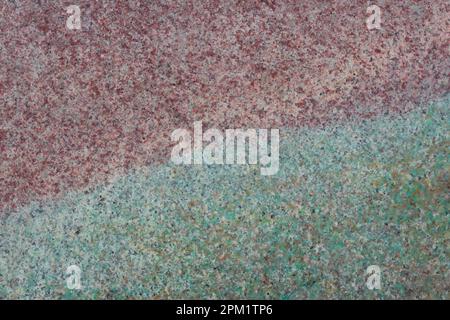 Texture of marble, concrete in two colors. Turquoise and pink color in the form of abstraction. Stock Photo