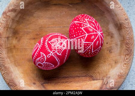 Two red Easter eggs dyed painted with traditional patterns, Hungary Stock Photo