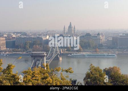 High angle view along Széchenyi Chain Bridge towards St. Stephen's Basilica from Buda Castle, Budapest. Stock Photo