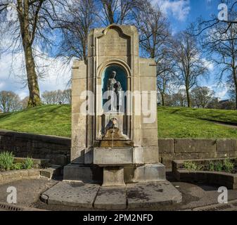 Fresh spring water running from the 'Well of living waters' in Buxton, Derbyshire. Stock Photo