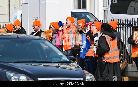 Brighton UK 11th April 2023 - Junior doctors on strike outside the Royal Sussex County Hospital in Brighton this morning as the British Medical Association begin their four day walk out in England : Credit Simon Dack / Alamy Live News Stock Photo