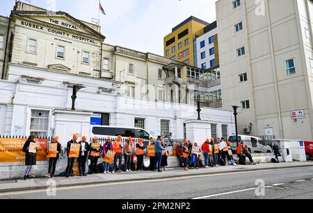 Brighton UK 11th April 2023 - Junior doctors on strike outside the Royal Sussex County Hospital in Brighton this morning as the British Medical Association begin their four day walk out in England : Credit Simon Dack / Alamy Live News Stock Photo