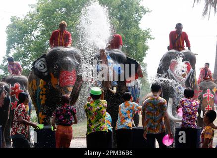 Ayutthaya, Thailand. 11th Apr, 2023. Elephants splash people with water in celebration of the Songkran Water Festival in Ayutthaya province, north of Bangkok. The event was held to promote tourism in Thailand. Credit: SOPA Images Limited/Alamy Live News Stock Photo