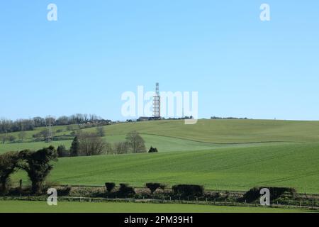View across fields to Tolsford Hill and mast from above New Barn, Lyminge, Folkestone, Kent, England, United Kingdom Stock Photo
