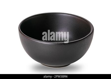 Empty black ceramic bowl isolated on white background with clipping path. Deep round black ceramic bowl , closeup view.. Stock Photo