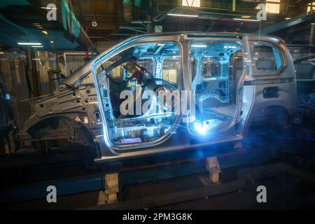 Robot arm welding at an automatized car factory Stock Photo