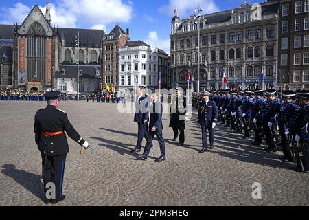 Amsterdam, Netherlands. 11th Apr, 2023. AMSTERDAM - French President Emmanuel Macron King Willem-Alexander removes the guard of honour. The presidential couple will pay a two-day state visit to the Netherlands. ANP OLAF KRAAK netherlands out - belgium out Credit: ANP/Alamy Live News Stock Photo