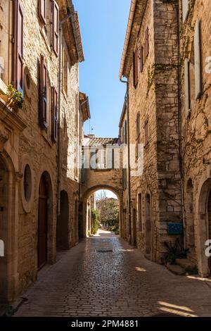 Street and passage in Vézénobres, a small medieval village in Gard, Occitanie, France Stock Photo