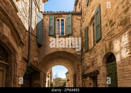 Street and passage in Vézénobres, a small medieval village in Gard, Occitanie, France Stock Photo