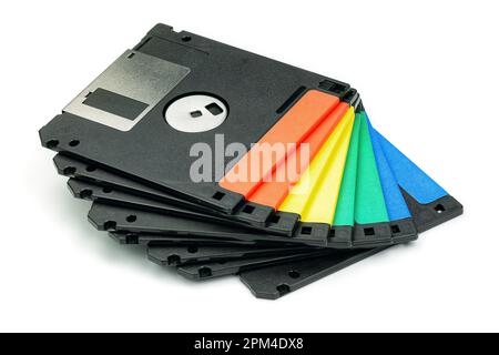 Stack of colored floppy diskettes top view isolated on white background. Stock Photo