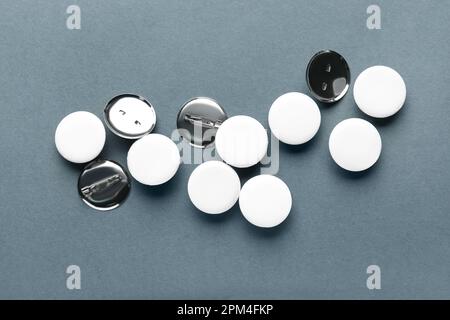 Blank white badges on grey background Stock Photo