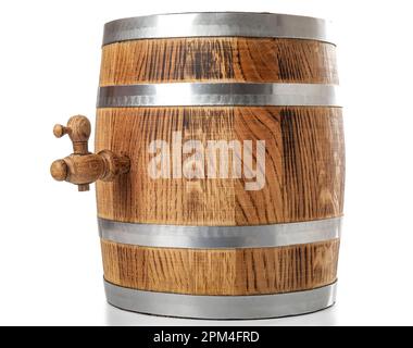 Oak barrel with metal hoops and tap isolated on white background Stock Photo