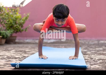 Arm balance pose Kukkutasana Rooster Pose - HealthyLife | WeRIndia