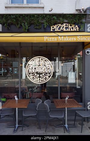 Pizza Express restaurant window, Barnes High Street, Barnes, London, SW13, England, UK - Pizza Makers since 1965 Stock Photo