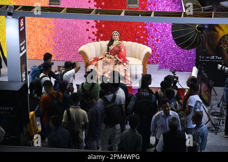 Kolkata, India. 11th Apr, 2023. A model poses at the Phototech India 2023 -  a photo & videography trade show on the first day of three days duration  that organized by a