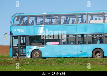 Double Decker Bus Operated By Arriva Yorkshire Travelling Along The double-decker-bus-operated-by-arriva-yorkshire-travelling-along-the