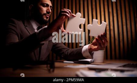 Attractive young guy is solving a problem Stock Photo