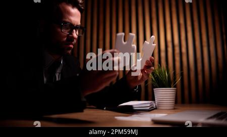 Attractive young guy is solving a problem Stock Photo