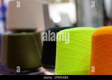 Knitting with multi colored yarn with orange, red, and yellow tones Stock  Photo - Alamy