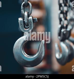 Verticl view of lifting hook in an industrial warehouse, France Stock Photo