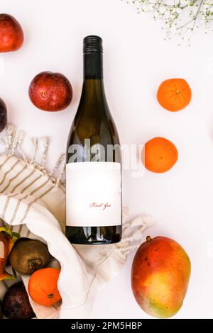 Full bottle pf Pinot Gris with spring fruit and open picnic Stock Photo