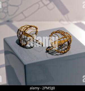 Delicate gold earring jewellery found in the ruins of Herculaneum, Italy Stock Photo