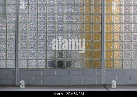 Closeup of a wall constructed with semi-transparent glass blocks. Stock Photo