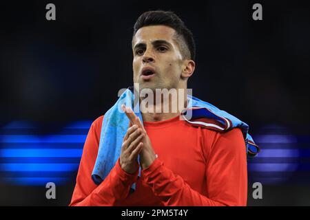 João Cancelo #22 of Bayern Munich applauds the travelling fans after the UEFA Champions League Quarter-Finals 1st Leg Manchester City vs Bayern Munich at Etihad Stadium, Manchester, United Kingdom, 11th April 2023  (Photo by Mark Cosgrove/News Images) Stock Photo