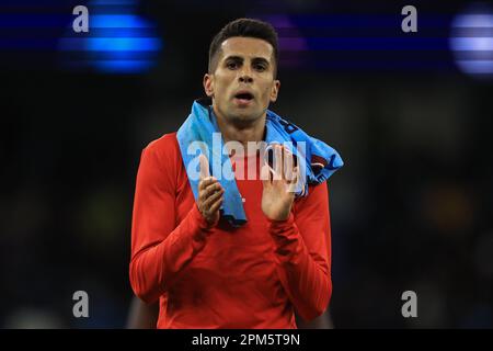 Manchester, UK. 11th Apr, 2023. João Cancelo #22 of Bayern Munich applauds the travelling fans after the UEFA Champions League Quarter-Finals 1st Leg Manchester City vs Bayern Munich at Etihad Stadium, Manchester, United Kingdom, 11th April 2023 (Photo by Mark Cosgrove/News Images) in Manchester, United Kingdom on 4/11/2023. (Photo by Mark Cosgrove/News Images/Sipa USA) Credit: Sipa USA/Alamy Live News Stock Photo