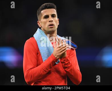 Manchester, UK. 11th Apr, 2023. Joao Cancelo of Bayern Munich applauds the fans during the UEFA Champions League match at the Etihad Stadium, Manchester. Picture credit should read: Gary Oakley/Sportimage Credit: Sportimage/Alamy Live News Stock Photo
