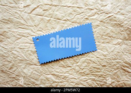 crumpled brown paper with card, decorative. paper textures Stock Photo
