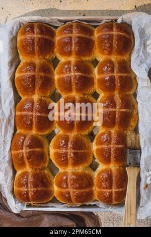 Hot cross buns in a baking tray Stock Photo