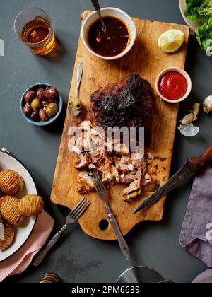 Dinner with pulled pork, potatoes and salad Stock Photo