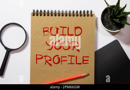 text Build your profile on torn paper, business concept. Stock Photo