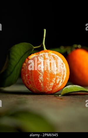 Macro Mandarin Orange on Dark Background Stock Photo