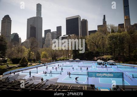 View of pickleball courts at Wollman Rink in Central Park, New York, NY, April 11, 2023. Described as a cross between tennis, wiffle ball and badminton, 14 courts will be open to the public from 7:00 AM to 9:00 PM starting in April through October. (Photo Vanessa Carvalho) Credit: Brazil Photo Press/Alamy Live News Stock Photo