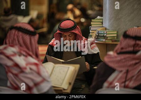 April 11, 2023, Jerusalem, Israel: Muslims read the Qur'an in Al-Aqsa Mosque, during the last ten days of the holy month of Ramadan, in which Muslims celebrate Laylat al-Qadr, the night of which cannot be determined with certainty. Muslims prepare to receive Laylat al-Qadr in the last 10 days of Ramadan. Laylat al-Qadr is a special night that is repeated every Hijri year in the blessed month of Ramadan. It is one of the last ten nights of Ramadan. It was mentioned in the Holy Quran and the biography of the Prophet Muhammad, so it is of great importance and privacy. (Credit Image: © Saeed Qaq/S Stock Photo