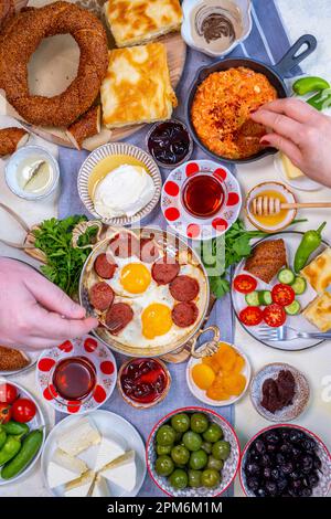 breakfast with traditional turkish simit and sucuk egg Stock Photo - Alamy