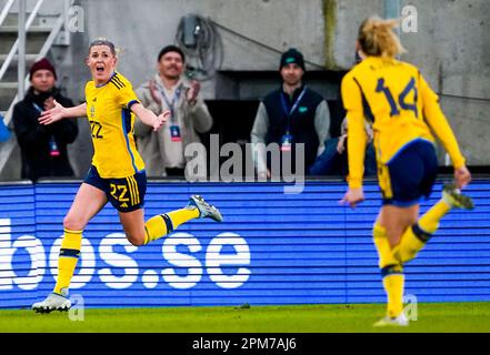 Gothenburg, Sweden 20230411.Sweden's Olivia Schough (left) celebrates after giving the home team a 3-2 lead in the women's private international soccer match between Sweden and Norway at Gamle Ullevi in Gothenburg. Photo: Lise Åserud / NTB Stock Photo