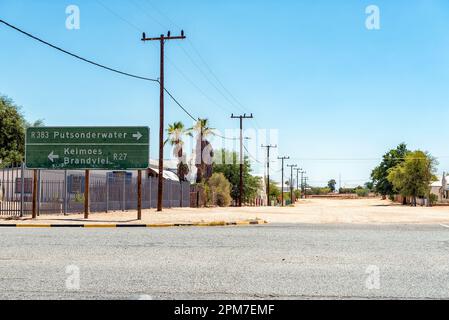 Kenhardt, South Africa - Feb 28 2023: A street scene in Kenhardt in the Northern Cape Province> A directional sign is visible Stock Photo