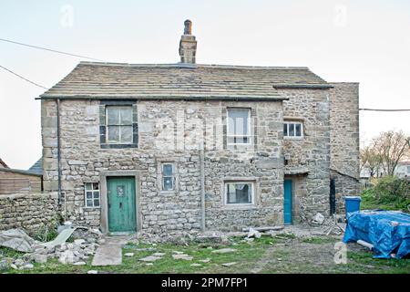 3 and 4, Back Green A Grade II Listed Building in Long Preston, North Yorkshire. Stock Photo