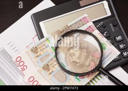 Polish money, 500 banknotes and calculator, bills concept Stock Photo